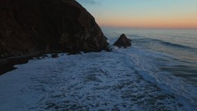 California ocean nature pillar USAL Beach Campground aerial drone bluffs cliffside mist clouds mountain rocky rugged remote coast vibrant sunset Sinkyone Wilderness waves crashing surf swell forward - Powered by Shutterstock - Get 15% off with code: PIKWIZARD15