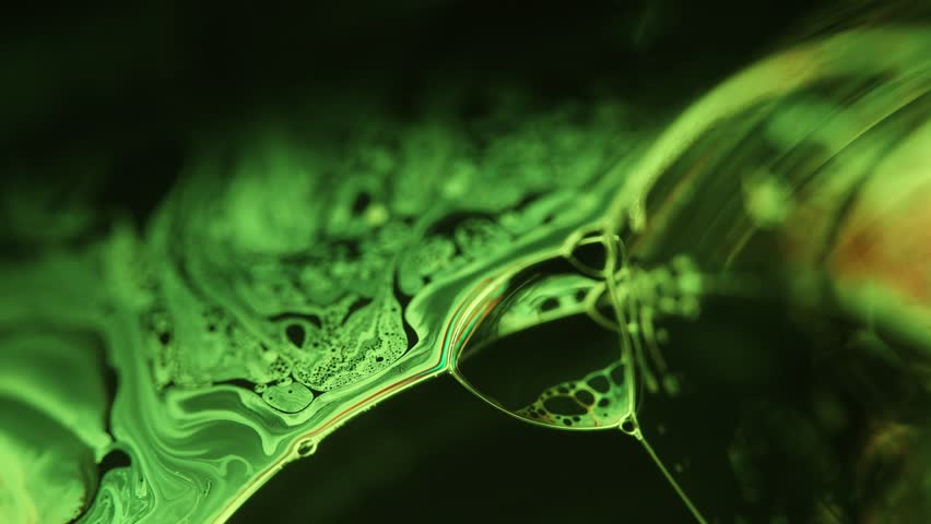 Green liquid surface on dark background, colourful abstract, surrealistic art, line of light, black background, beautiful science