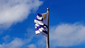Low-angle, slow-motion video of the uruguay flag gracefully waving against sky, captured at the monumento a la bandera in plaza democracia, montevideo city, uruguay - Powered by Shutterstock - Get 15% off with code: PIKWIZARD15