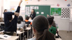 School children are participating actively in class. Education - Powered by Shutterstock - Get 15% off with code: PIKWIZARD15