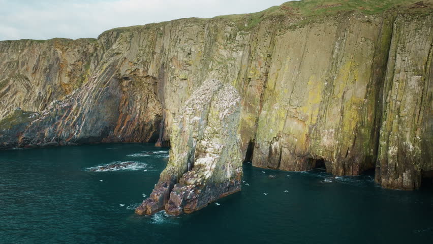 Drone shot of Old Head of Kinsale cliffs, County Cork, Ireland 13