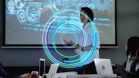 Business meeting with diverse team and digital circular animation overlay. Teamwork, collaboration, technology, innovation, brainstorming, diversity - Powered by Shutterstock - Get 15% off with code: PIKWIZARD15