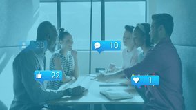 Discussing animation, diverse team at table with social media icons in school. Teamwork, collaboration, diversity, creativity, brainstorming, innovation - Powered by Shutterstock - Get 15% off with code: PIKWIZARD15