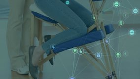 Animation of digital icons overlaying massage therapist assisting client in spa. Wellness, relaxation, therapy, digital interface, technology, assistance - Powered by Shutterstock - Get 15% off with code: PIKWIZARD15