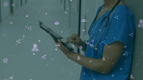 Using tablet with social media icons overlay, healthcare professional in animation. Technology, digital, connectivity, innovation, communication, network - Powered by Shutterstock - Get 15% off with code: PIKWIZARD15