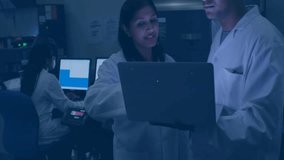 Collaborating scientists using laptop with network connections animation in laboratory. Research, innovation, teamwork, technology, connectivity, analysis - Powered by Shutterstock - Get 15% off with code: PIKWIZARD15