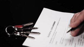 Signing a residential rental agreement with keys and cash – real estate and tenancy concept - Powered by Shutterstock - Get 15% off with code: PIKWIZARD15