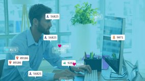 Working at desk, man receiving social media notifications overlaying computer screen. Technology, multitasking, digital, office, communication - Powered by Shutterstock - Get 15% off with code: PIKWIZARD15