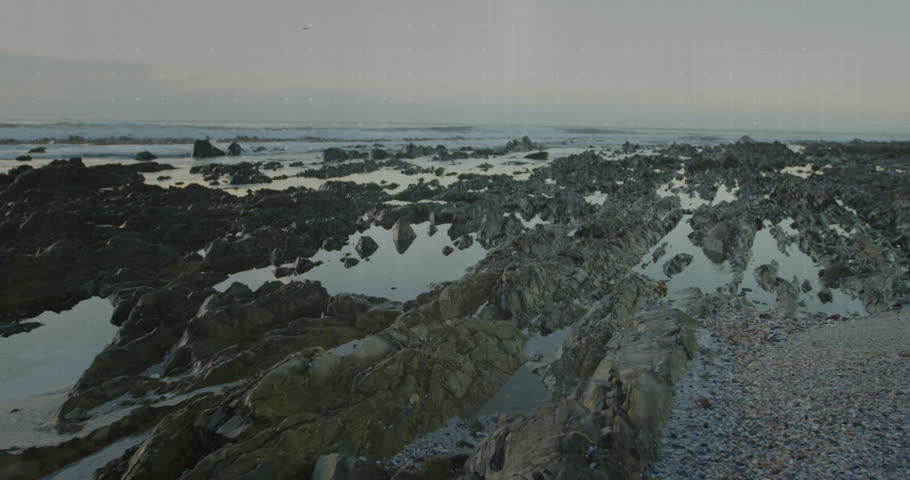 Overlaying animation, graph and data visualization on rocky coastal landscape scene. Nature, analytics, technology, coastline, infographic, statistics