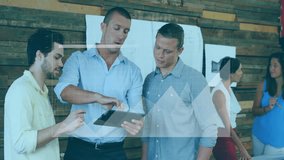 Business team discussing data on tablet with graph animation overlay. Teamwork, collaboration, digital, technology, analytics, brainstorming - Powered by Shutterstock - Get 15% off with code: PIKWIZARD15