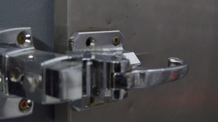 Corpse in a morgue being removed by doctor