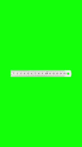 Metal ruler isolated on green background.