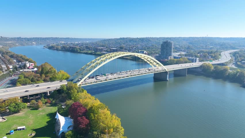 Aerial Arc of Cincinnati Ohio River Bridge and Skyline