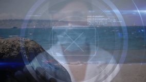 Futuristic digital interface animation over beach scene with ocean and rocks. Technology, innovation, seaside, landscape, virtualreality, immersive - Powered by Shutterstock - Get 15% off with code: PIKWIZARD15