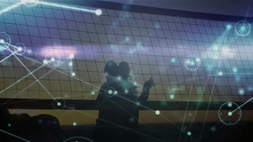 Volleyball players silhouetted with digital network animation overlay in action. Sports, teamwork, athletic, connection, motion, technology - Powered by Shutterstock - Get 15% off with code: PIKWIZARD15