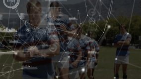 Rugby players in action, data processing animation overlay in background. Sports, teamwork, competition, technology, digital, statistics - Powered by Shutterstock - Get 15% off with code: PIKWIZARD15