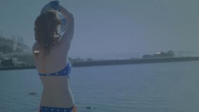 Woman in swimsuit at beach with digital data processing animation overlay. Technology, innovation, seaside, virtual, graphics, future - Powered by Shutterstock - Get 15% off with code: PIKWIZARD15