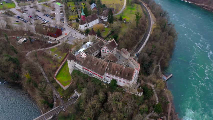 Schloss Laufen am Rheinfall, Schaffhausen, Schweiz Luftaufnahme im Fruehling. Laufen Castle with Rhine Falls in Swiss canton Zurich, Switzerland aerial view in spring. Landmark and attraction point. 