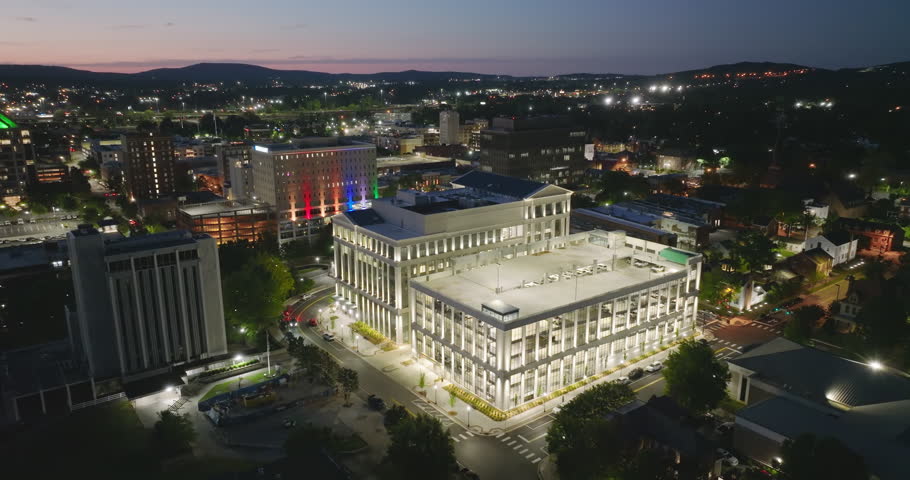 Historical American city architecture at night. Huntsville, old city in Alabama state. Illuminated streets and buildings from above.