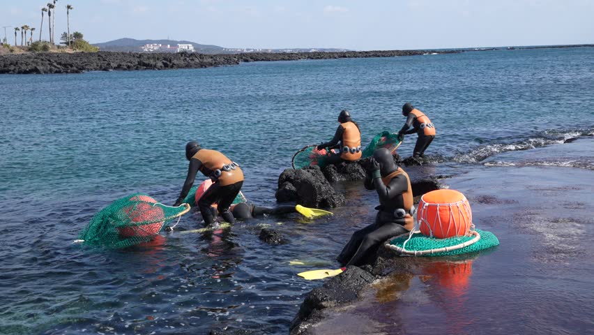 female diver, Jeju haeneyo in Seogwipo coast