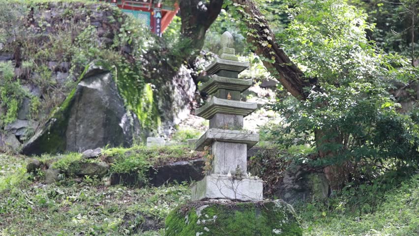 a stone pagoda in the forest