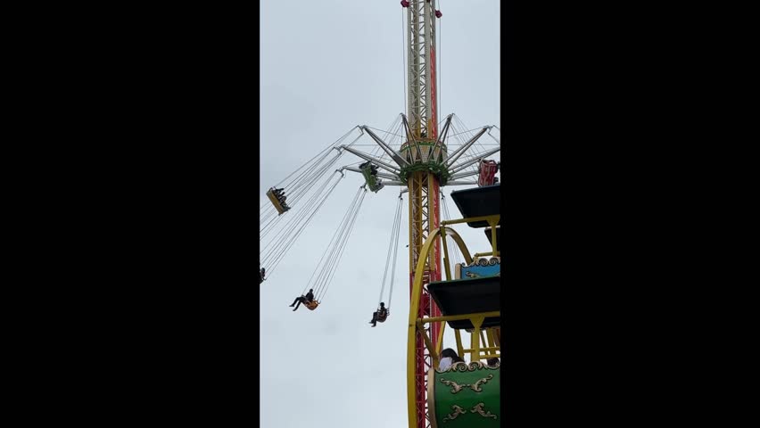 The people are having fun in a theme park, fair in Antalya, Turkiye