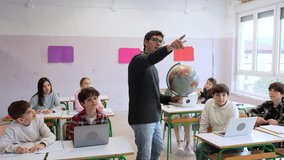 Geography teacher presenting global perspectives while engaging students with educational globe during classroom lesson - Powered by Shutterstock - Get 15% off with code: PIKWIZARD15