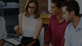 Discussing financial data and stock market graphs, diverse professionals in office meeting. Finance, business meeting, teamwork, analysis, corporate, strategy - Powered by Shutterstock - Get 15% off with code: PIKWIZARD15