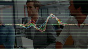 In office, business team discussing colorful data graphs with animated overlay. Collaboration, teamwork, brainstorming, analytics, innovation, corporate - Powered by Shutterstock - Get 15% off with code: PIKWIZARD15