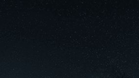 Time lapse of Starry night sky, A clear view of the night sky filled with countless stars, with the silhouette of a tree barely visible in the bottom right corner - Powered by Shutterstock - Get 15% off with code: PIKWIZARD15