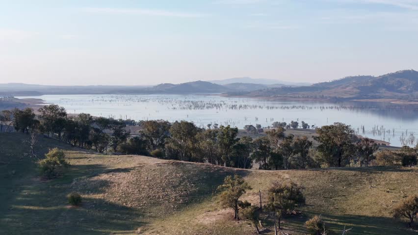 Views of Lake Hume at low level near Huon and the surrounding rolling hills