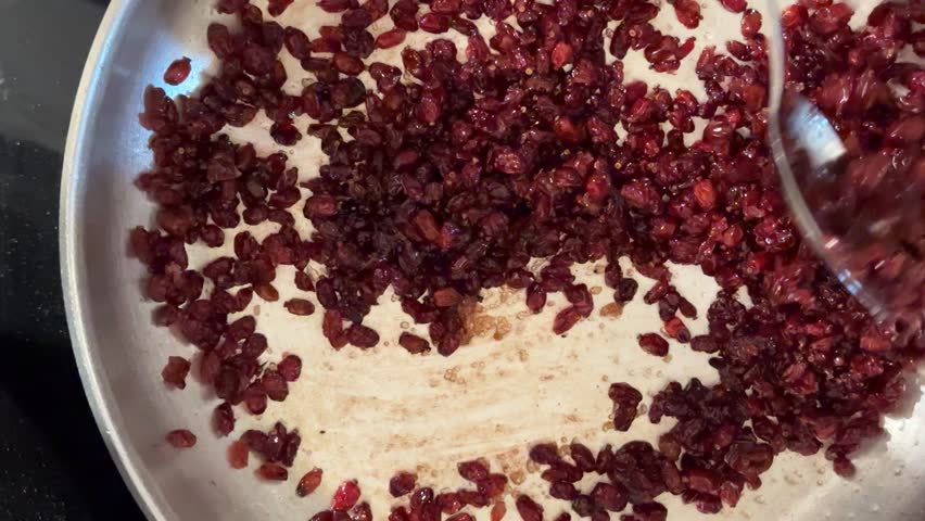 tasty persian barberry in cooking method recipe with red sour berries as rice topping antioxidant rich dry fruit from khorasan iran harvested local natural organic healthy cuisine outdoor rural season