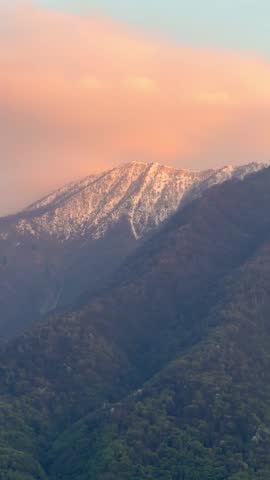 picturesque red sunset over Lake Como Italy with mountain view. Scenic and peaceful Italian landscape, perfect for travel footage, cinematic backgrounds, nature videos, and romantic content