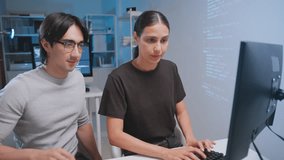 Two developers collaborating coding and software tasks modern workspace, utilizing teamwork and technology with programming computer monitor and tablet for coding developer software programmer code - Powered by Shutterstock - Get 15% off with code: PIKWIZARD15