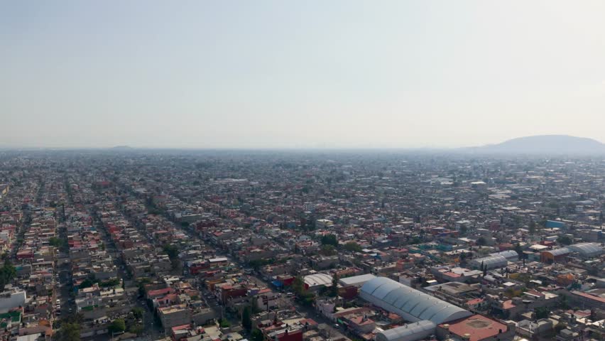 Smoggy day in Ecatepec, Mexico, showing its urban sprawl during an environmental contingency
