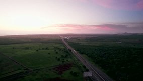 Aerial view of motorway in green countryside with sunset sky, Mazatlan - Powered by Shutterstock - Get 15% off with code: PIKWIZARD15