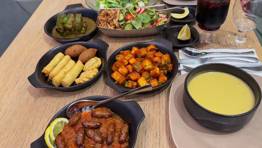 Experience a vibrant Lebanese feast in 4K. Perfect for culinary projects, cultural showcases, and food-themed content. Capture the essence of Middle Eastern dining