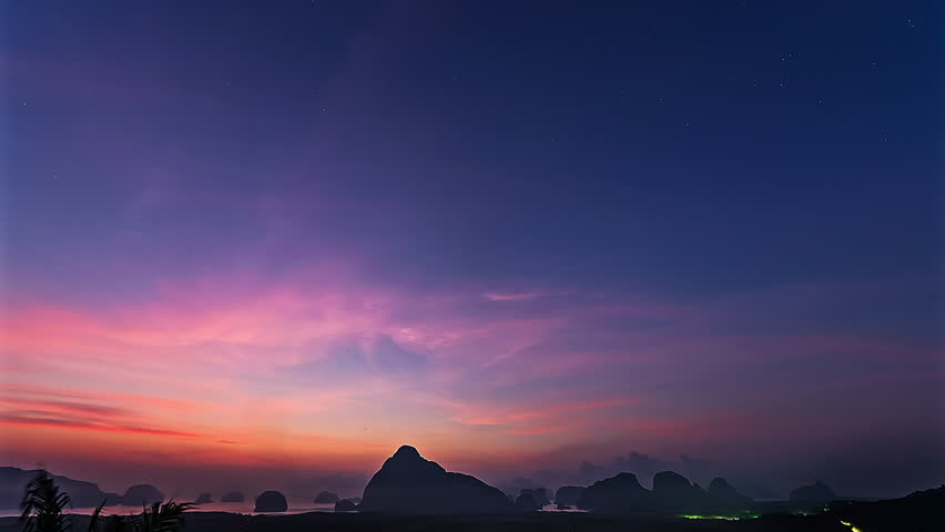time lapse milky way above Samed Nang Chee viewpoint. The night sky saw bright stars in the space. Milky Way over the islands. stars in the galaxy.The Milky Way rising above Samed Nang Chee islands.