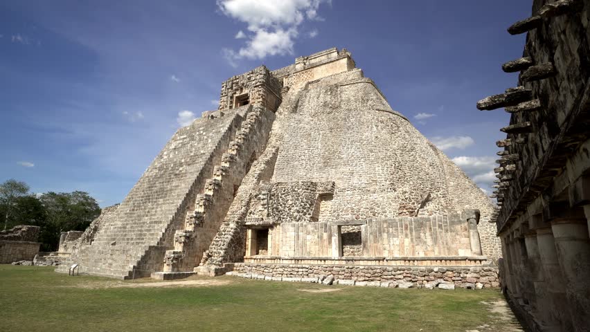 Panoramic view around ancient historical symbol pyramid of Mayas culture in summer suuny day