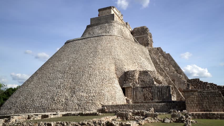 Panoramic view around ancient historical symbol pyramid of Mayas culture in summer suuny day