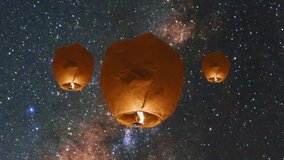 Floating Lanterns in Starry Sky. Magical Lanterns Under the Stars.
 - Powered by Shutterstock - Get 15% off with code: PIKWIZARD15