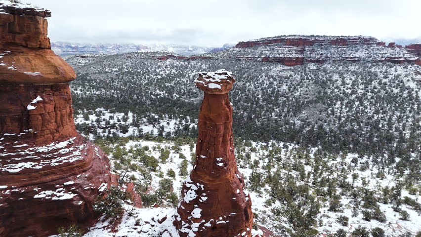 Cinematic aerial view of epic winter landscape in Sedona, Arizona, USA