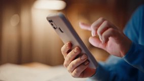 Woman hands tapping smartphone in dark apartment in lamp light closeup. Unrecognizable lady making online purchase by cellphone app in night home. Young freelancer browsing message on mobile phone. - Powered by Shutterstock - Get 15% off with code: PIKWIZARD15