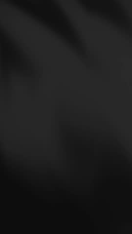 Smooth, elegant abstract smoke moving against a black background. Suitable for intros, dramatic scenes, or visual effects.