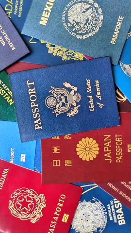 Background consisting of passports of different countries as conceptual wallpaper for your design