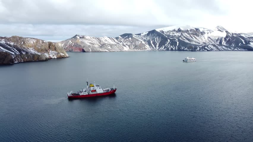 4K video. Icebreaker ship in the Southern Ocean. Antarctica. Drone view. View from above. 