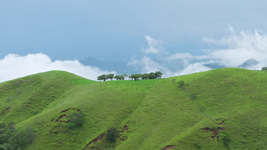 Embark on a journey to admire aerial views of Costa Ricas grasslands and meadows, showcasing diverse ecosystems and beautiful landscapes at sunrise and sunset for an unforgettable experience