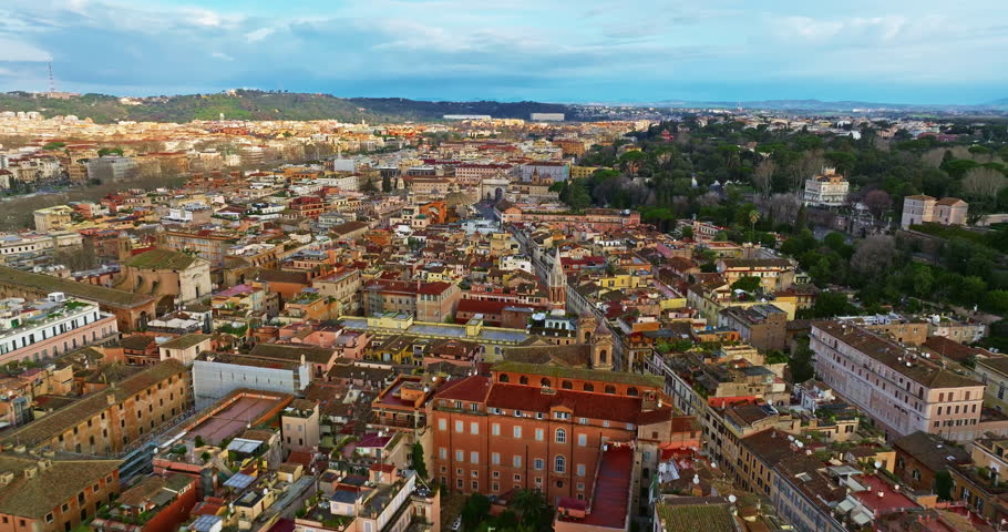 Aerial view rooftops of the city of Rome, Italy. Establishing shot of the capital