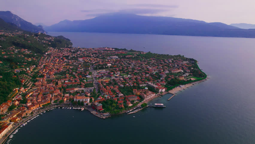 Small city in italy, Tuscany, with a beautiful view, massive deep blue lake. Coast of Como lake