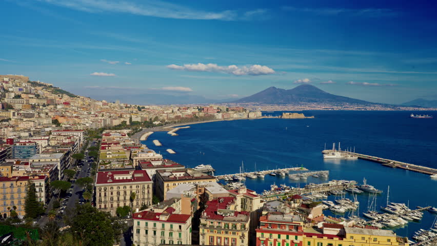 View of the Gulf of Naples with Mount Vesuvius far in the background at sunny day. Naples, Italy